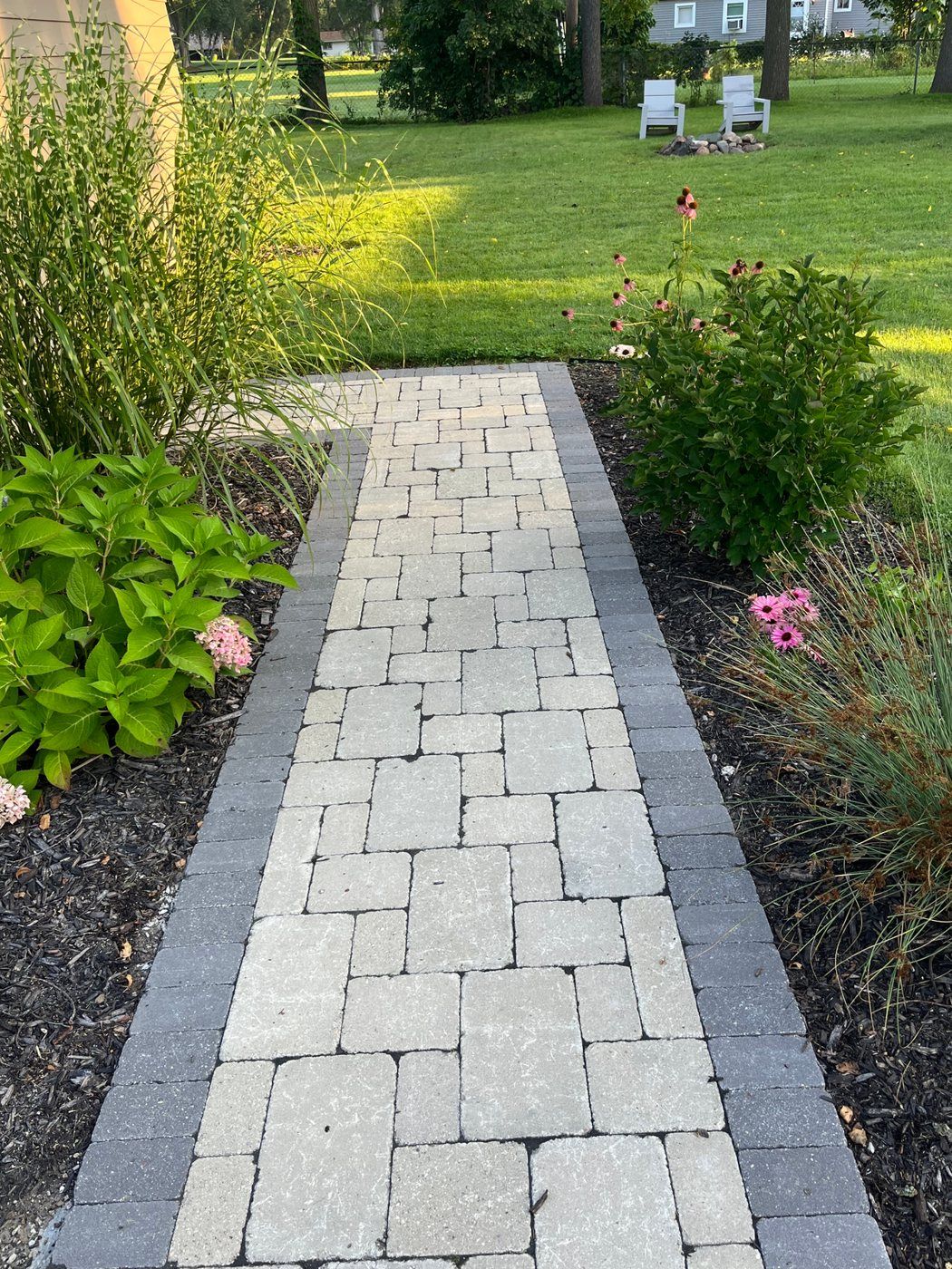 Brick paver walkway with a contrasting border